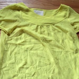 Anthropologie yellow laser cut shirt